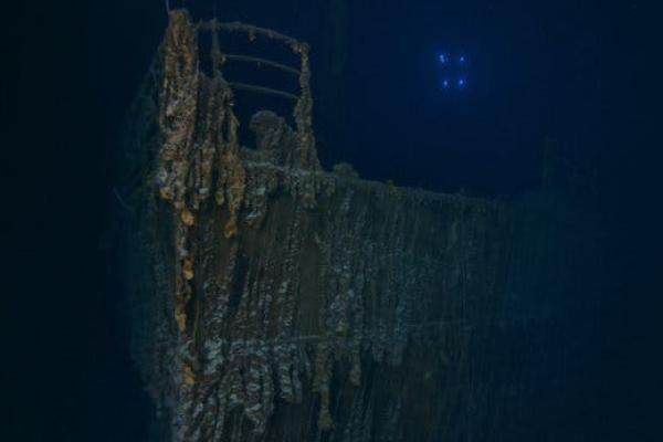 The bow of the Titanic and an area where the railing is missing.