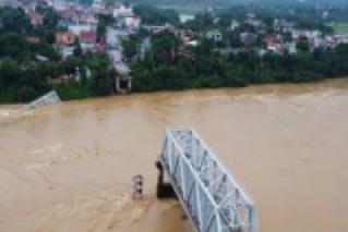 Vietnam, Philippines clean up after Typhoon Yagi.